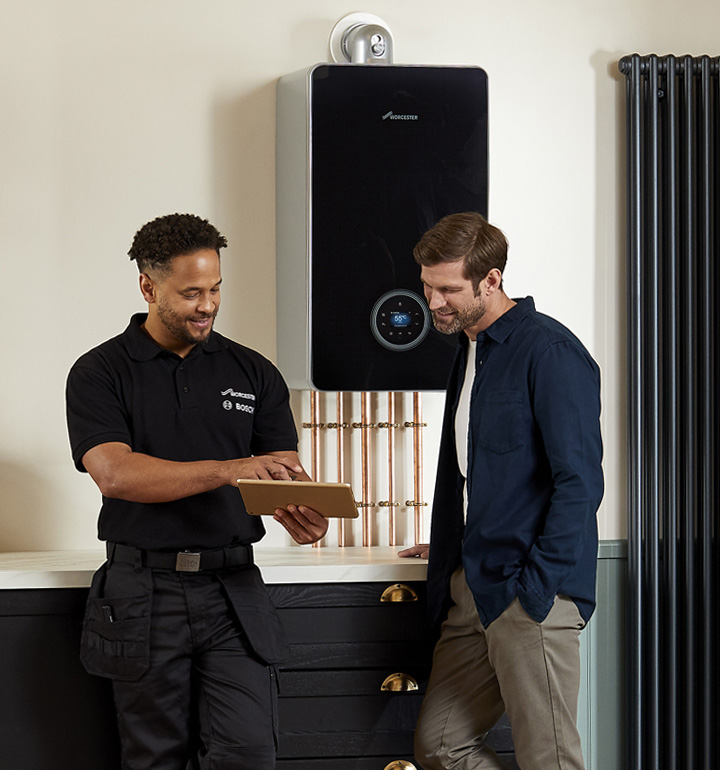 Installer Talking to Customer About a Boiler